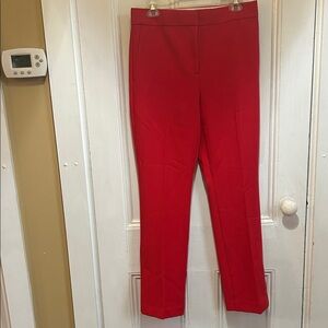 Ann Taylor Vibrant Red Boot Cut Trousers. Pant leg with side slit